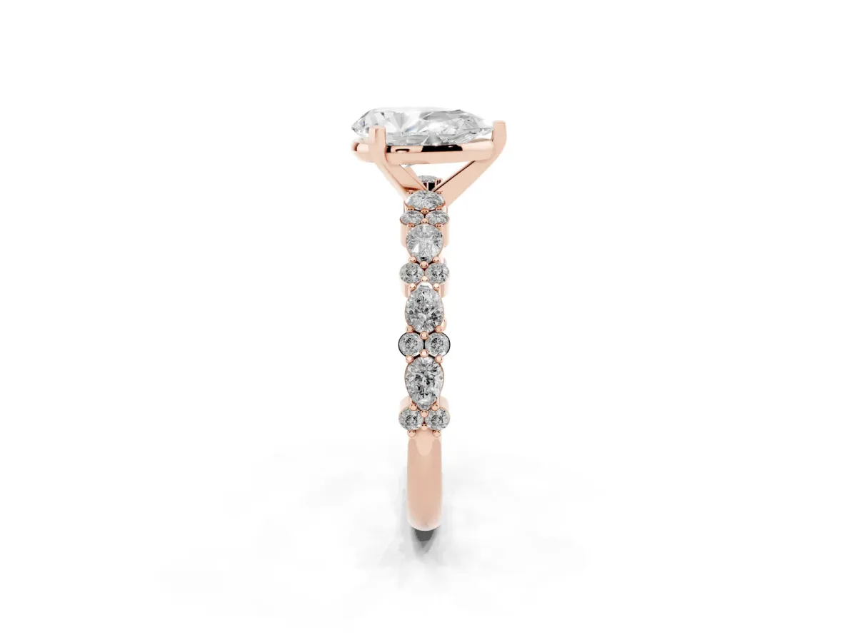 Pear Cut Diamond Side Stone Solitaire Ring with Round and Four-Prong Setting Rose gold
