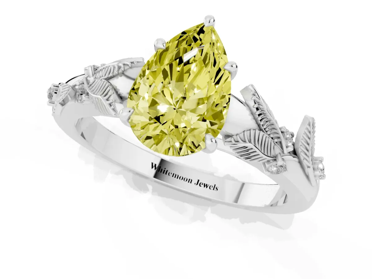 Fancy Yellow Pear Cut Diamond Solitaire Ring with Leaf Motif Band and Four-Prong Setting Silver