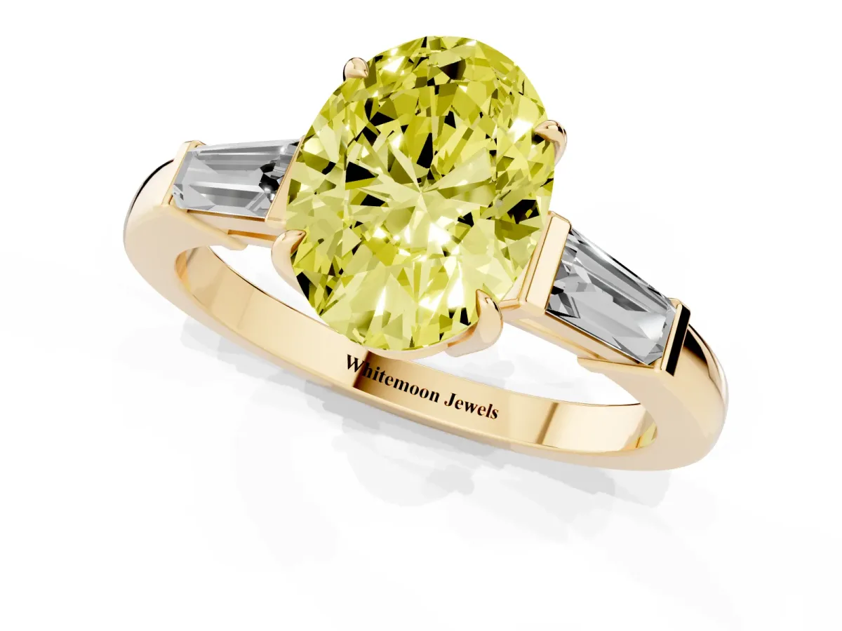 Fancy Yellow Oval Cut Diamond Three-Stone Ring with Tapered Baguette Side Stones and Prong Setting Yellow gold