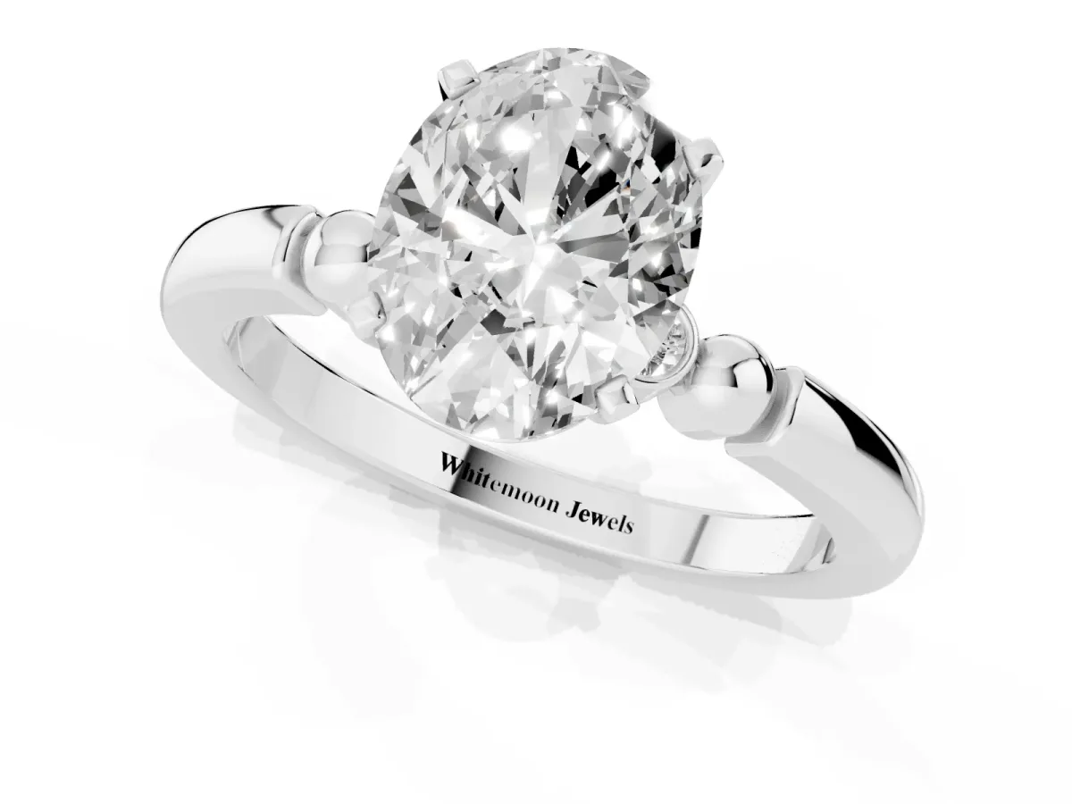 Oval Cut Solitaire Beaded Band with Four-Prong Setting White gold