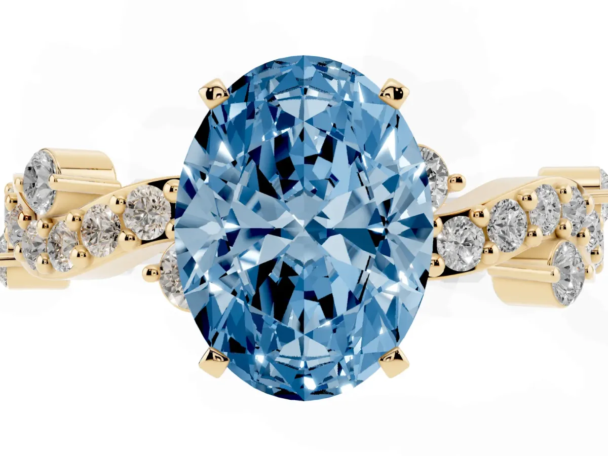 Fancy Blue Oval Cut Cut Solitaire Diamond Twisted Band with Pave Setting Yellow gold