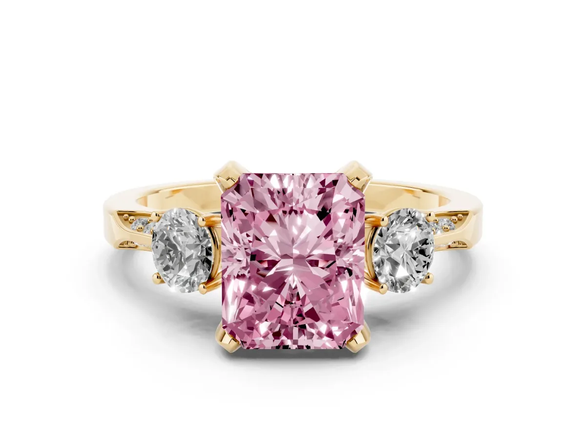 Fancy Pink Radiant Cut Brilliant Three-Stone Diamond Ring with Pavé Band and Four-Prong Setting Yellow gold