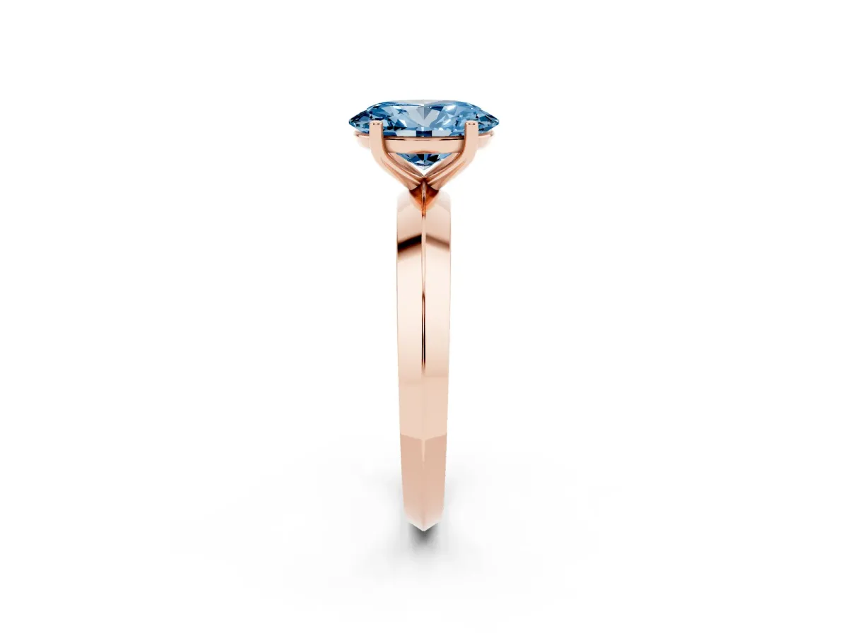 Fancy Blue Oval Cut Cut Solitaire Engagement Ring with Flat Band and Four-Prong Setting Rose gold
