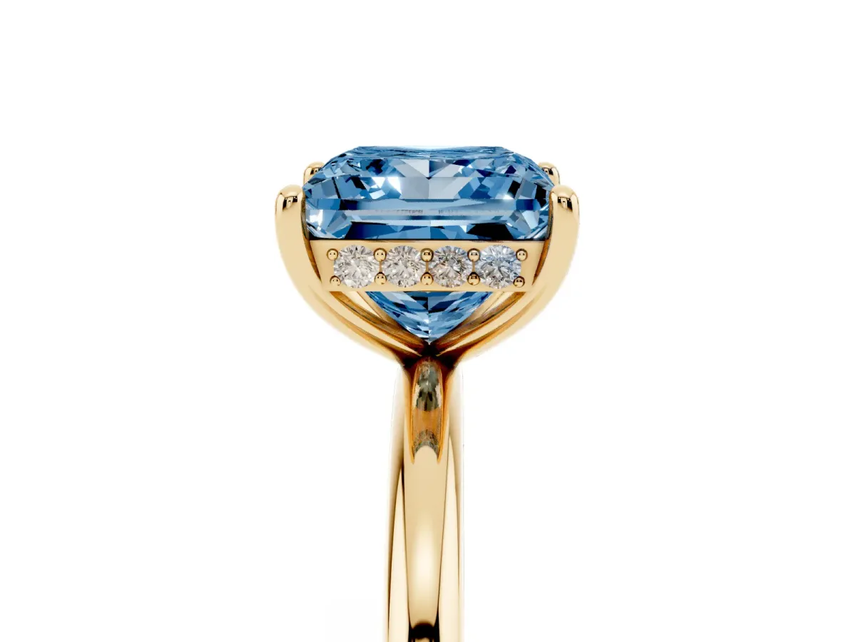 Fancy Blue Princess Cut Solitaire Diamond Ring with a Classic Band and Four-Prong Setting Yellow gold