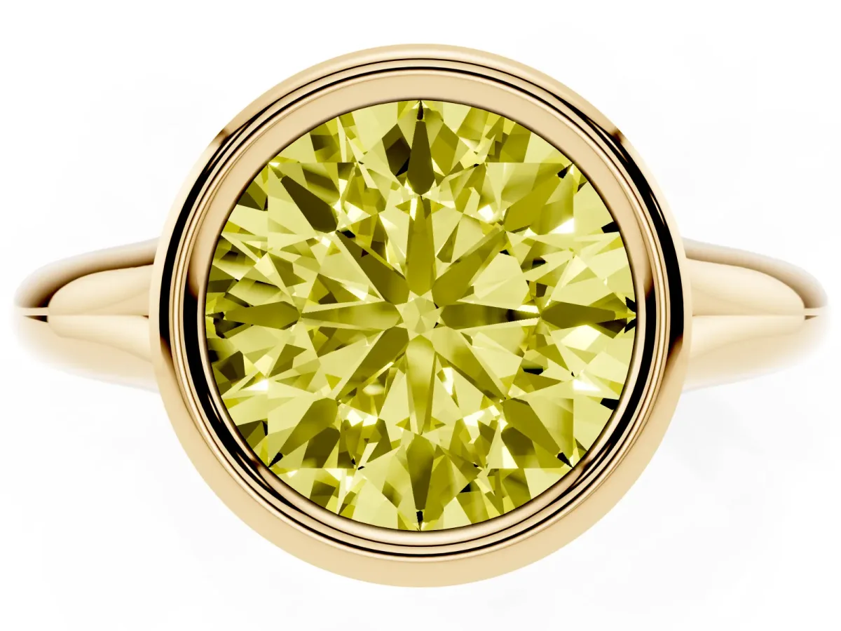 Fancy Yellow Bezel Set Round Cut Solitaire Diamond Ring with Smooth Band Yellow gold