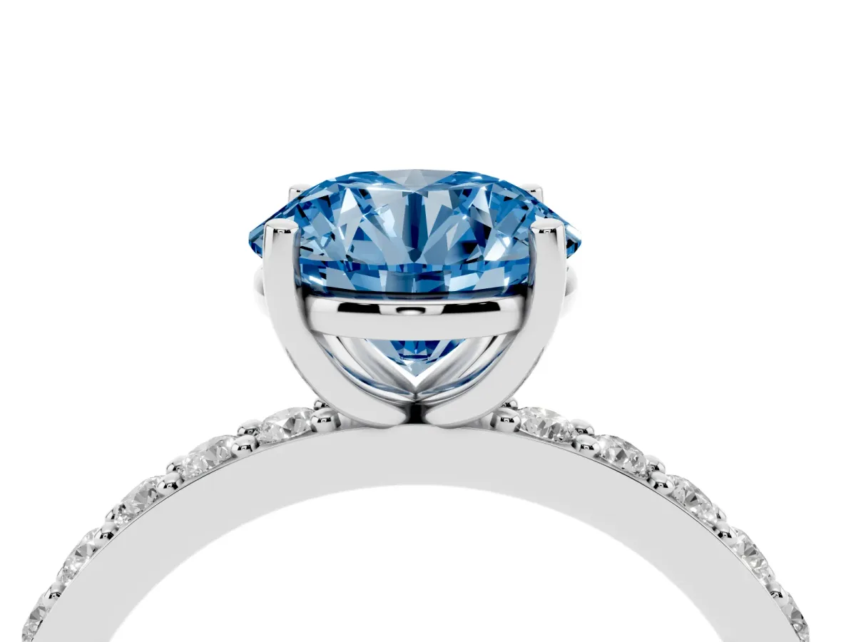 Fancy Blue Round Cut Cut Diamond Solitaire with Pave Band and Four-Prong Setting Silver