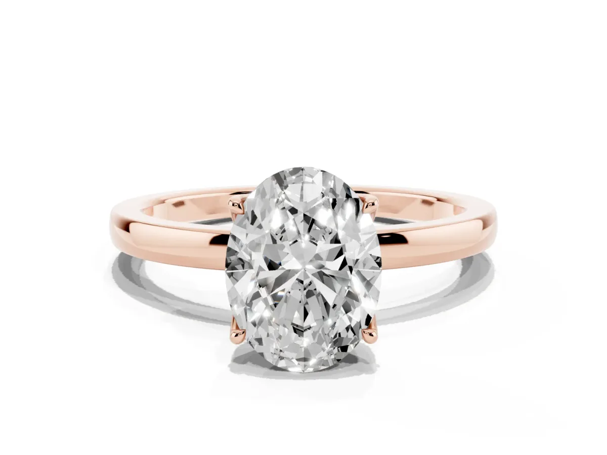 Oval Cut Diamond Solitaire Ring with Thin Band and Prong Setting Rose gold