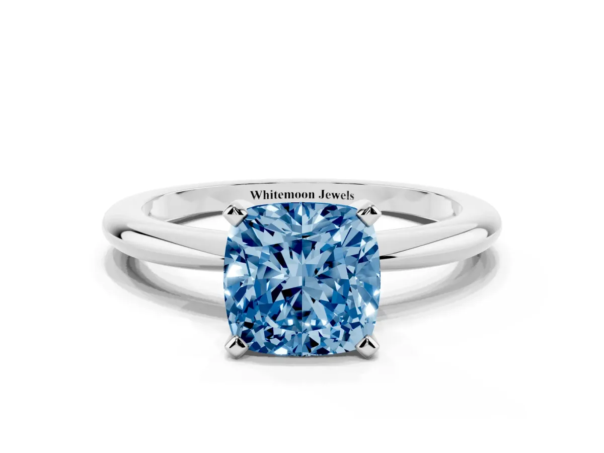 Fancy Blue Cushion Cut Diamond Solitaire Ring with Prong Setting and Classic Band Silver