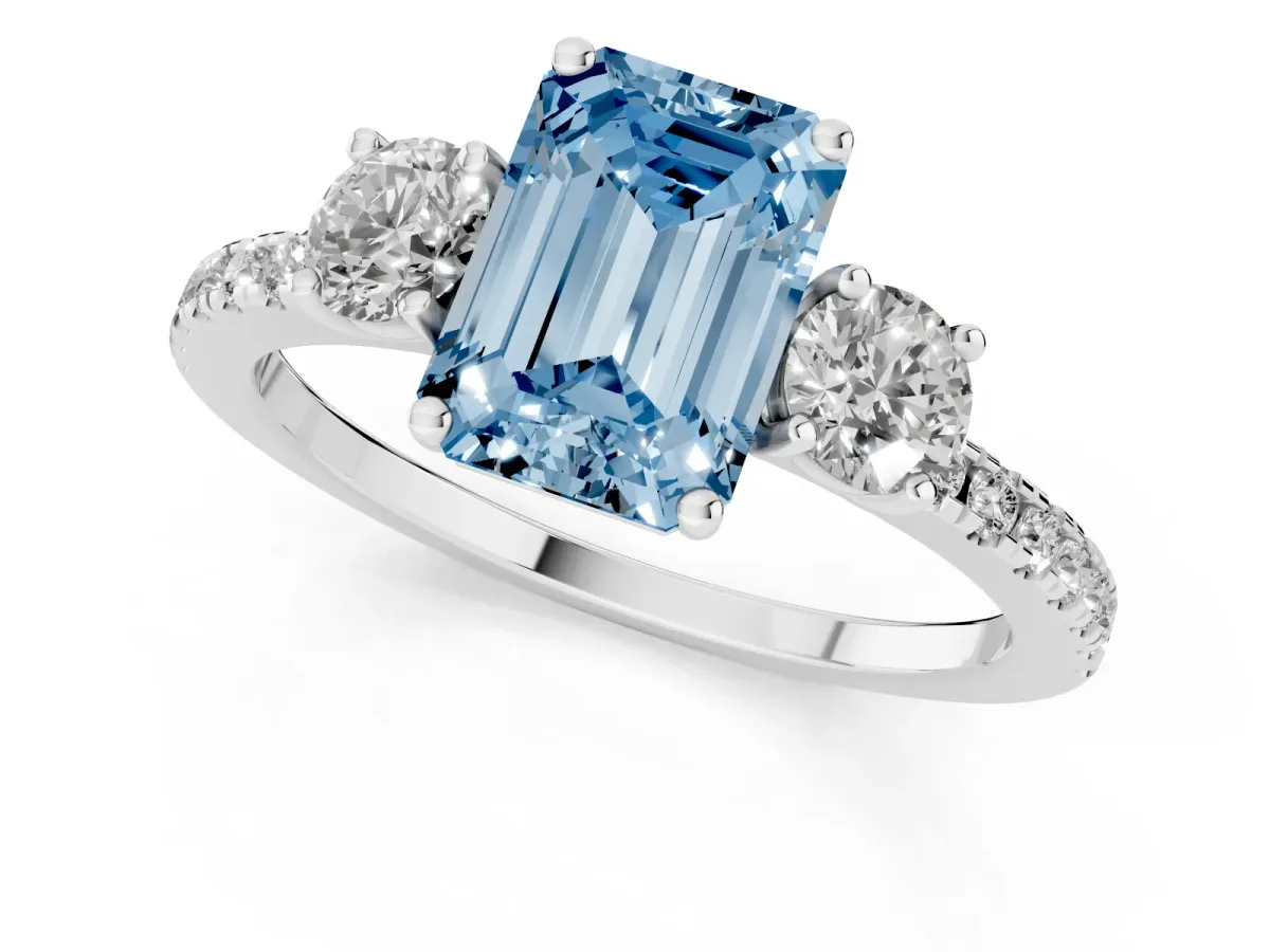 Fancy Blue Three-Stone Emerald Cut Cut Diamond Pavé Band with Prong Setting Platinum