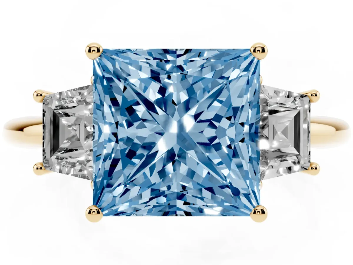 Fancy Blue Princess Cut Diamond Three-Stone Ring with Trapezoid Side Stones and Prong Setting Yellow gold