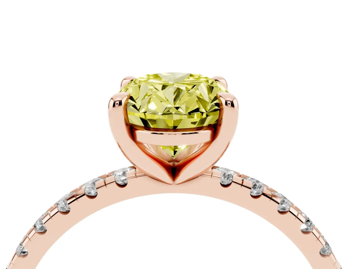 Fancy Yellow Oval Cut Diamond Brilliant Solitaire Ring with Pavé Band and Four-Prong Setting Rose gold