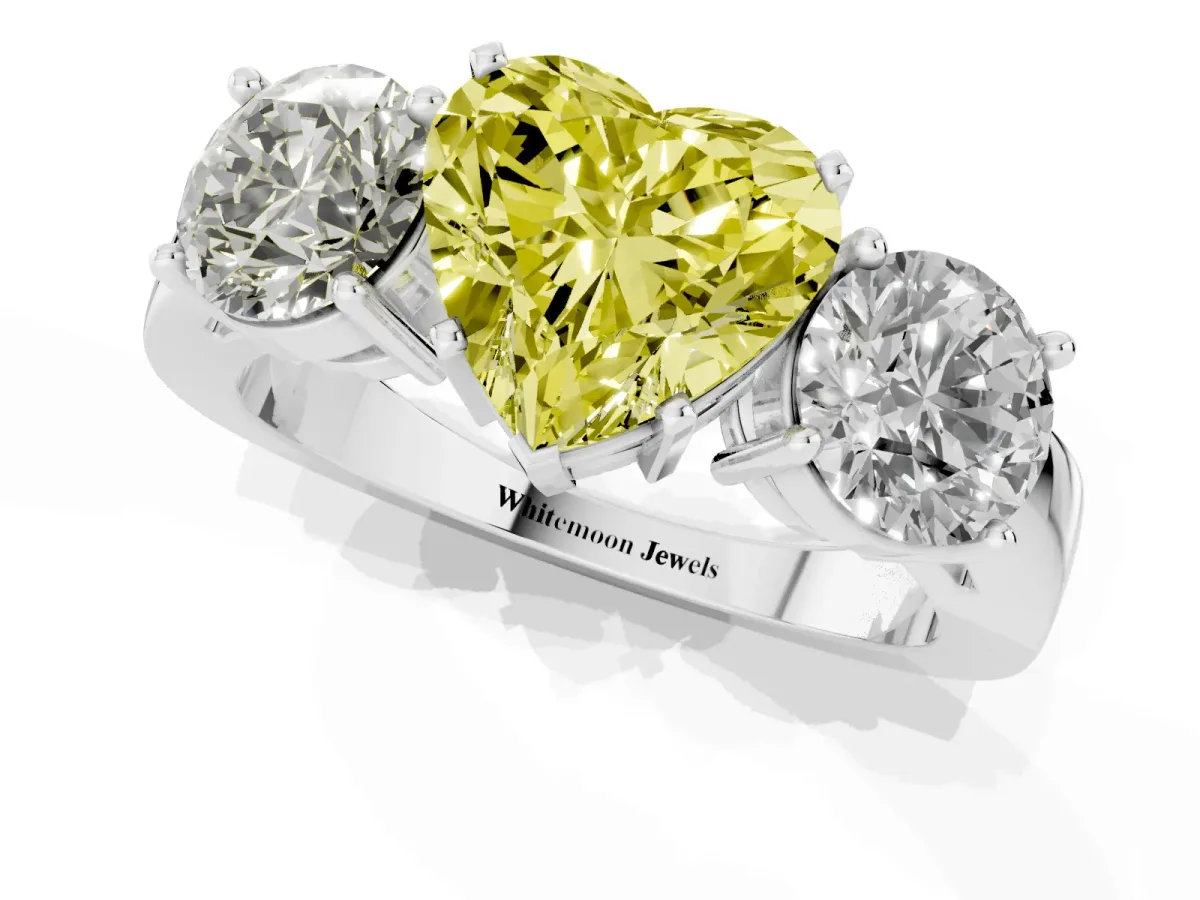 Fancy Yellow Three-Stone Heart Cut Diamond Ring with Round Side Stones, Classic Band, and Four-Prong Setting White gold