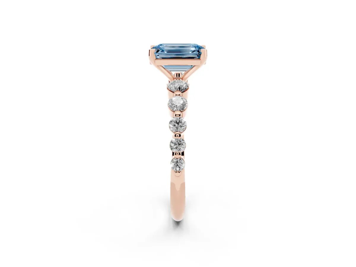 Fancy Blue Emerald Cut Solitaire Diamond Ring with Pave Band and Four-Prong Setting Rose gold