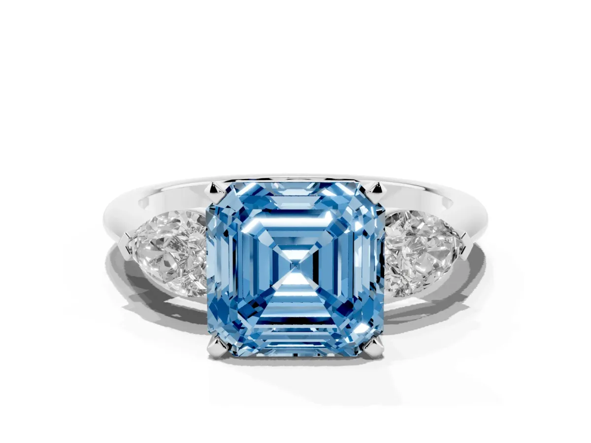 Fancy Blue Three-Stone Asscher Cut Diamond Ring with Pear Side Stones and Four-Prong Setting Platinum