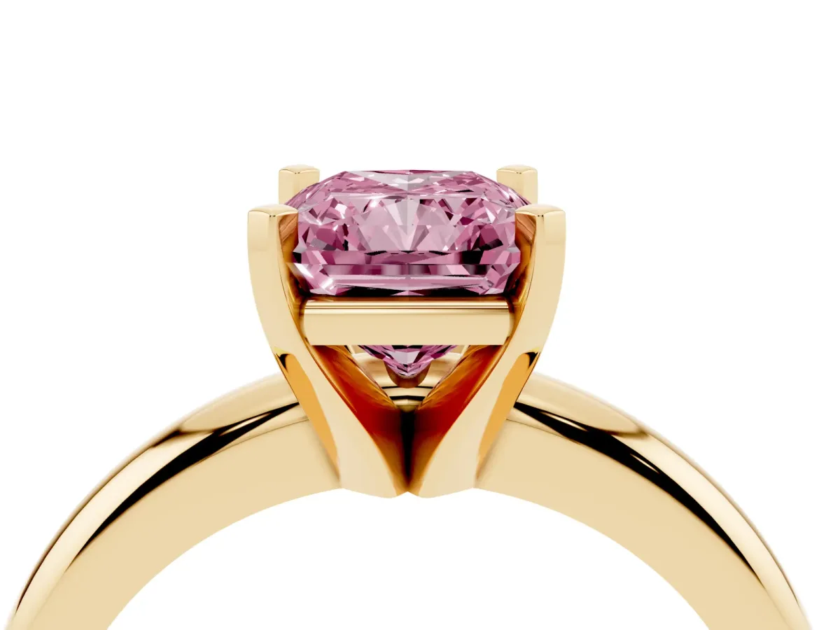 Fancy Pink Radiant Cut Diamond Solitaire Engagement Ring with Round Band and Four-Prong Setting Yellow gold