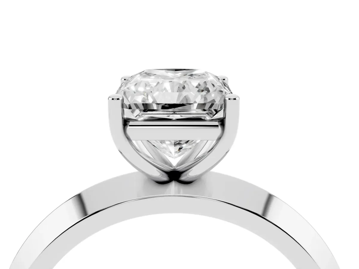 Radiant Cut Cut Solitaire Engagement Ring with Flat Band and Four-Prong Setting Silver