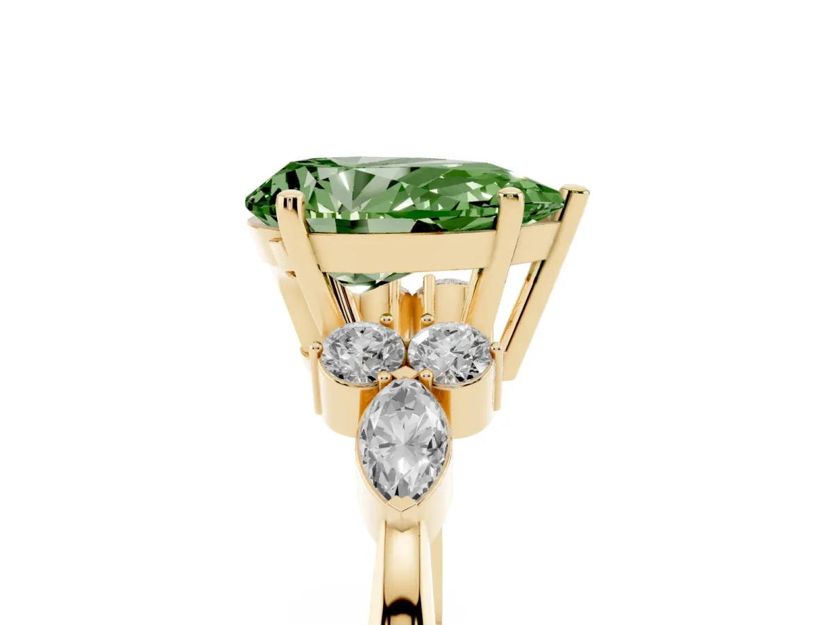 Fancy Green Pear Cut Brilliant Diamond Solitaire Ring with Pear Side Stones and Four-Prong Setting Yellow gold