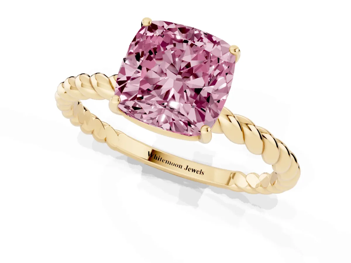 Fancy Pink Cushion Cut Solitaire Twist Band Ring with Four-Prong Setting Yellow gold