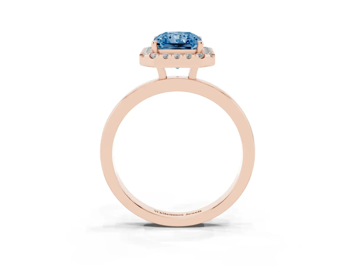 Fancy Blue Radiant Cut Halo Diamond Solitaire with Pavé Band and Four-Prong Setting Rose gold