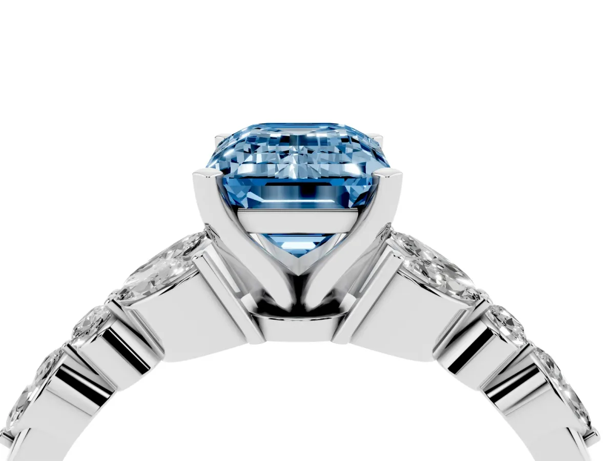 Fancy Blue Emerald Cut Diamond Solitaire Ring with Side Stones and Four-Prong Setting Platinum