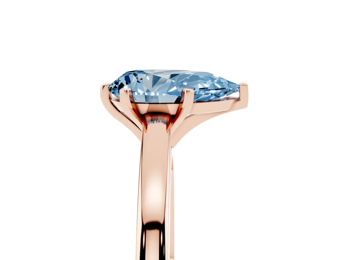 Fancy Blue Pear Cut Solitaire Diamond Engagement Ring with Four-Prong Setting on a Classic Band Rose gold