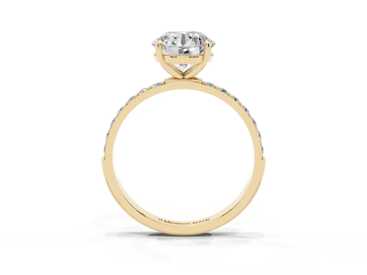 Round Cut Diamond Solitaire Ring with Round Pavé Shoulders and Prong Setting Yellow gold