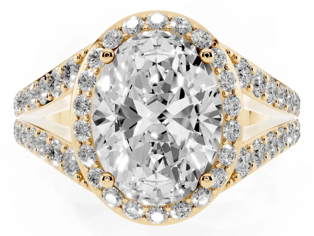 Oval Cut Diamond Split Shank Halo Ring with Four-Prong Setting Yellow gold