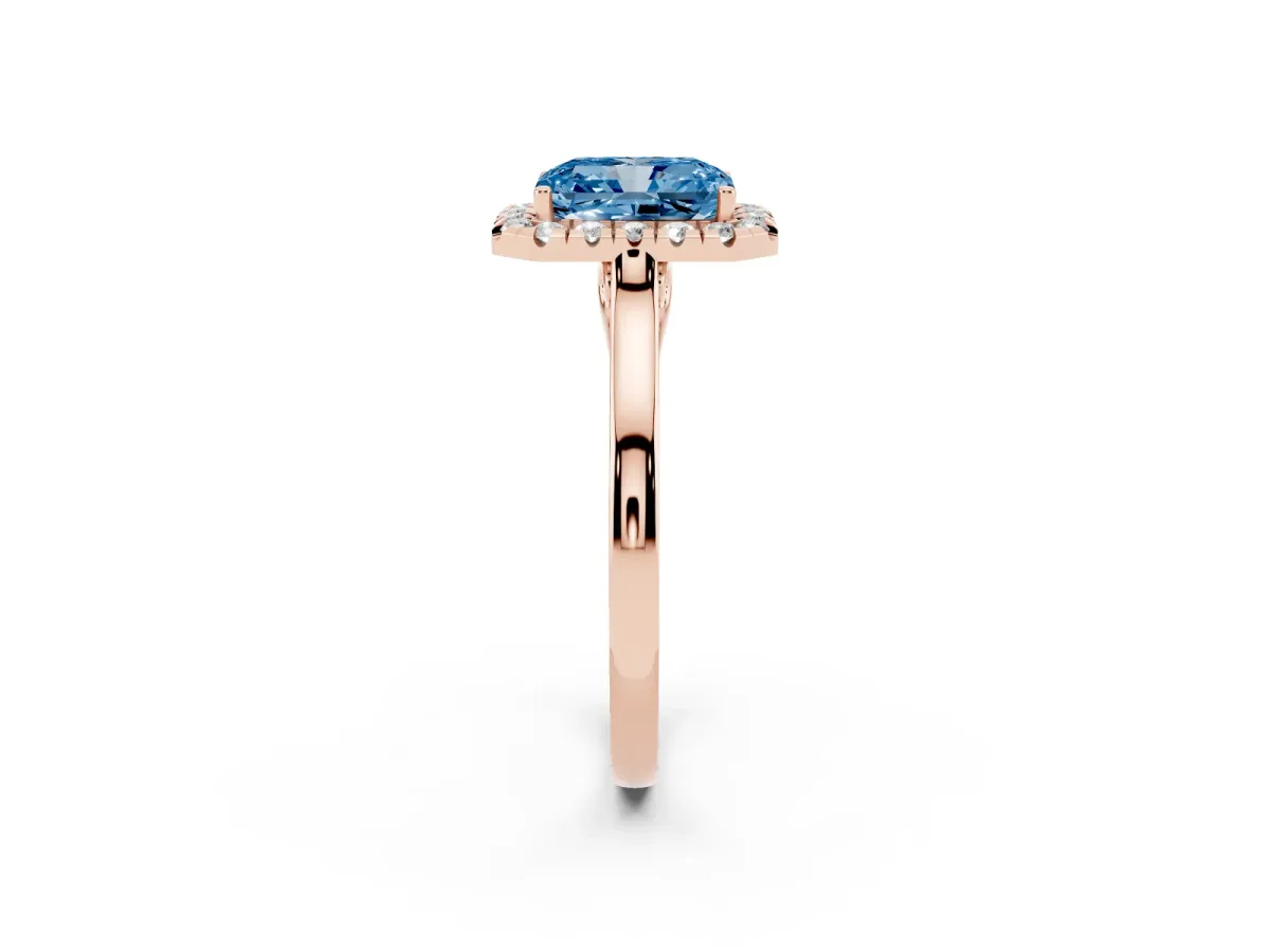 Fancy Blue Radiant Cut Halo Round Diamond Solitaire Ring with Pavé Band and Four-Prong Setting Rose gold