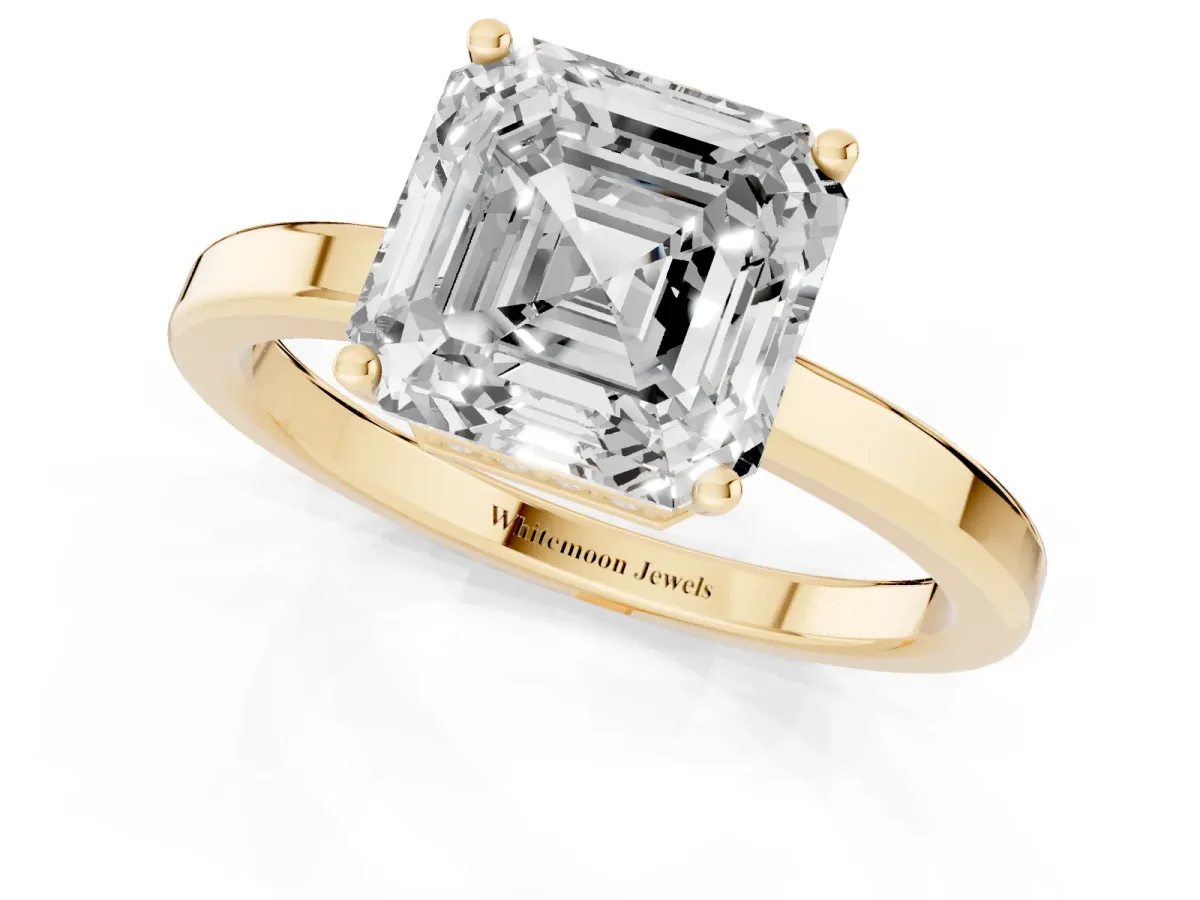 Asscher Cut Cut Solitaire Engagement Ring with Four-Prong Setting on a Classic Band Yellow gold