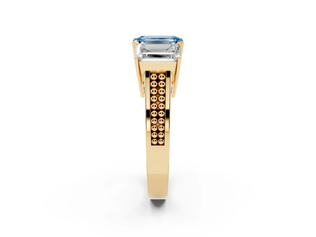 Fancy Blue Emerald Cut Diamond Three-Stone Ring with Prong Setting and Textured Band Yellow gold
