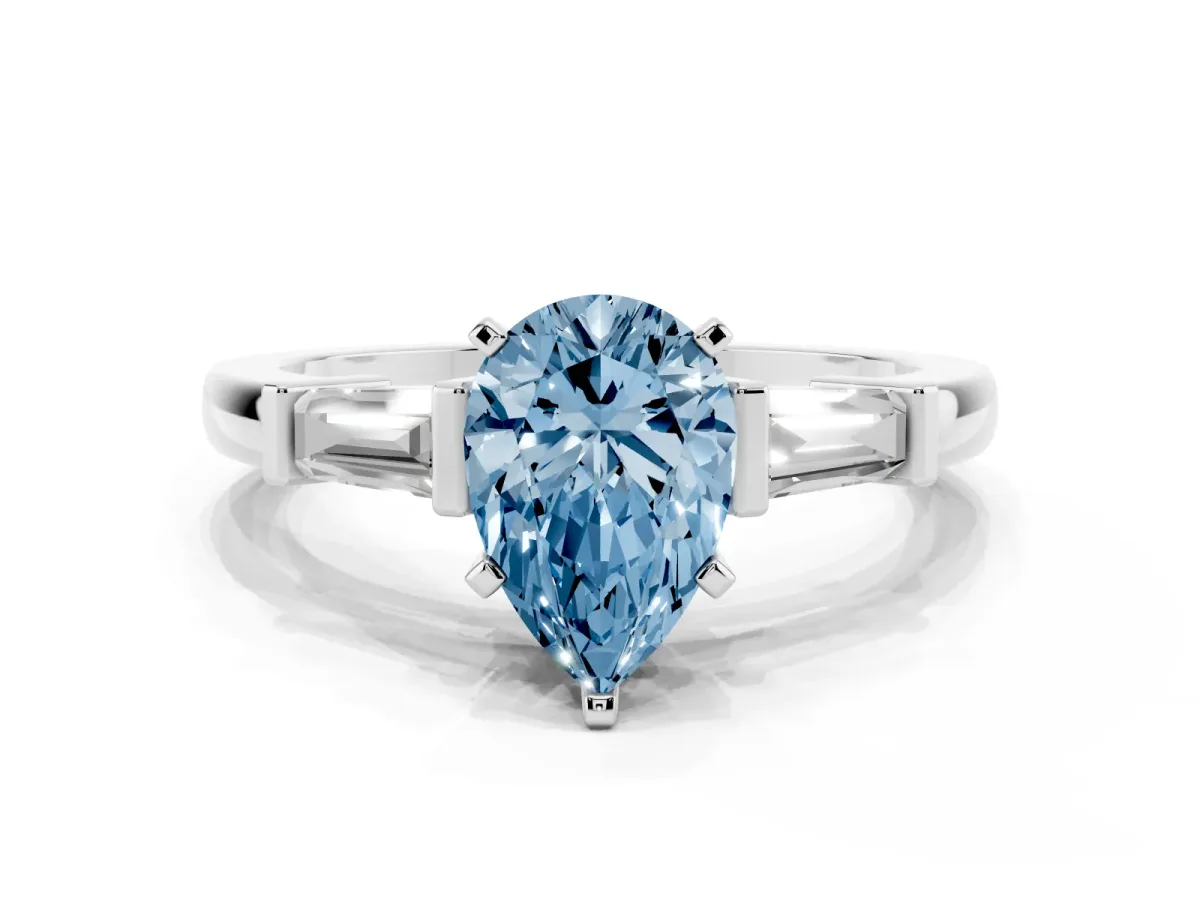 Fancy Blue Pear Cut Cut Diamond Solitaire Ring with Tapered Baguette Accents and Four-Prong Setting White gold