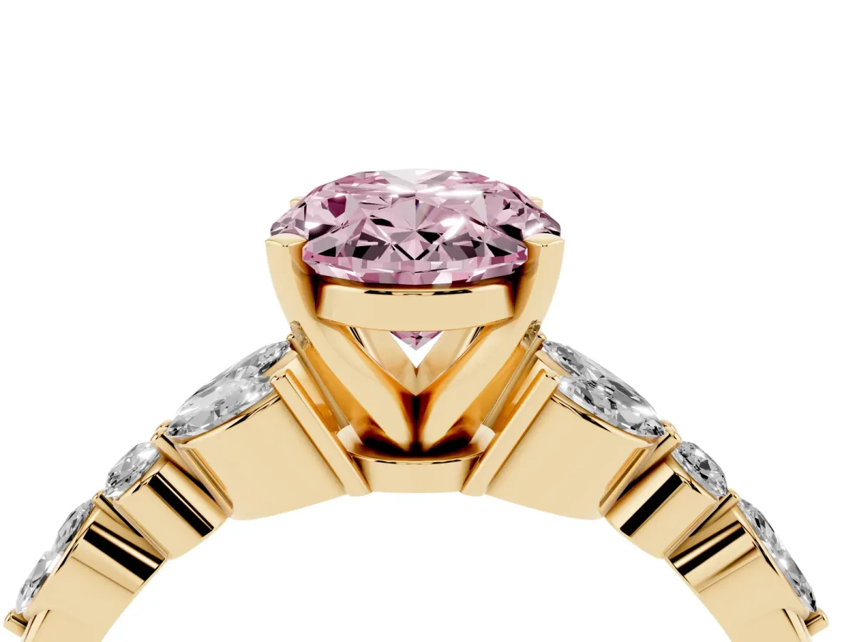 Fancy Pink Oval Cut Diamond Solitaire Ring with Side Stones and Four-Prong Setting Yellow gold