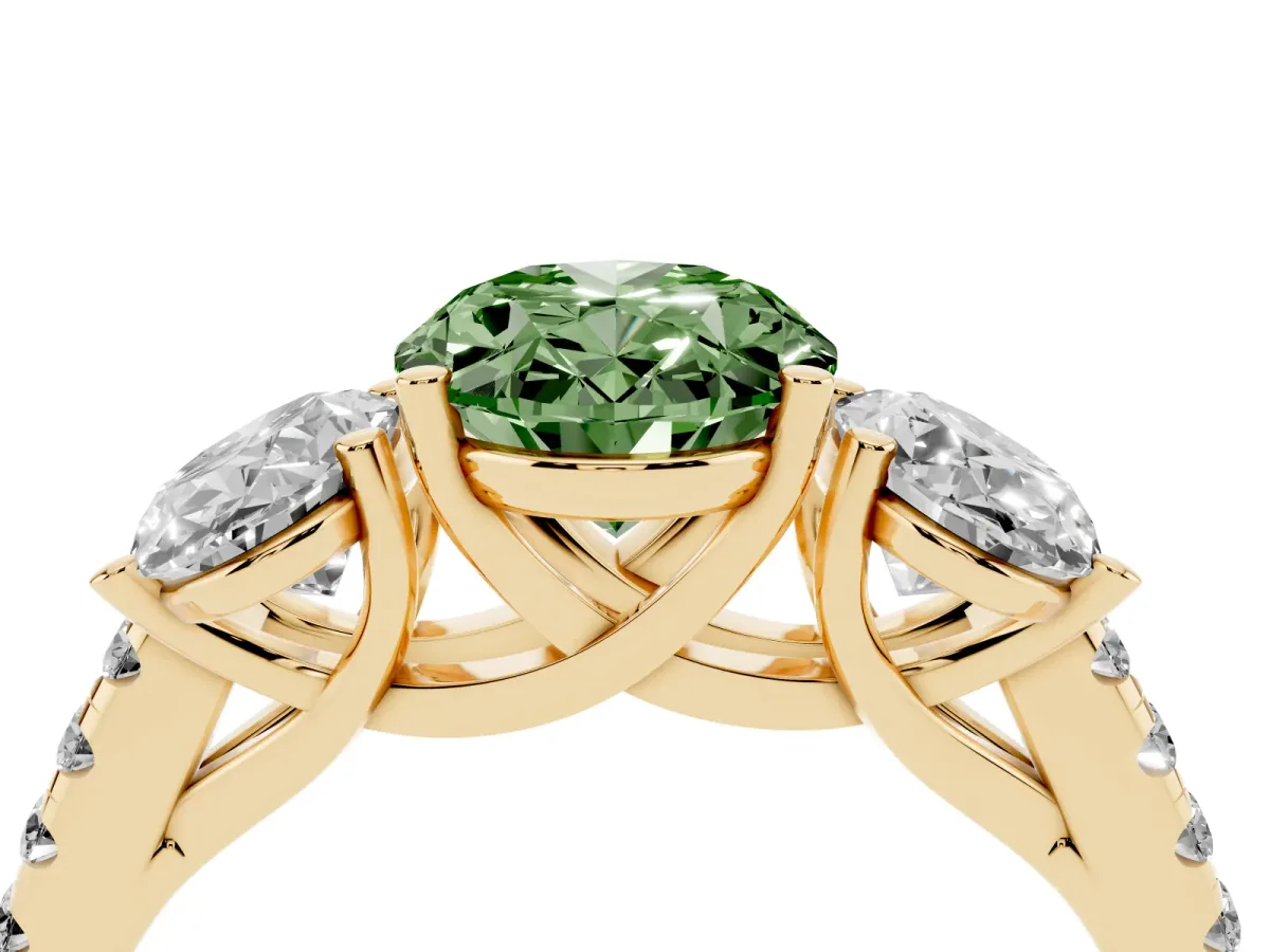 Fancy Green Three-Stone Oval Cut Diamond Ring with Round Pavé Band and Prong Setting Yellow gold