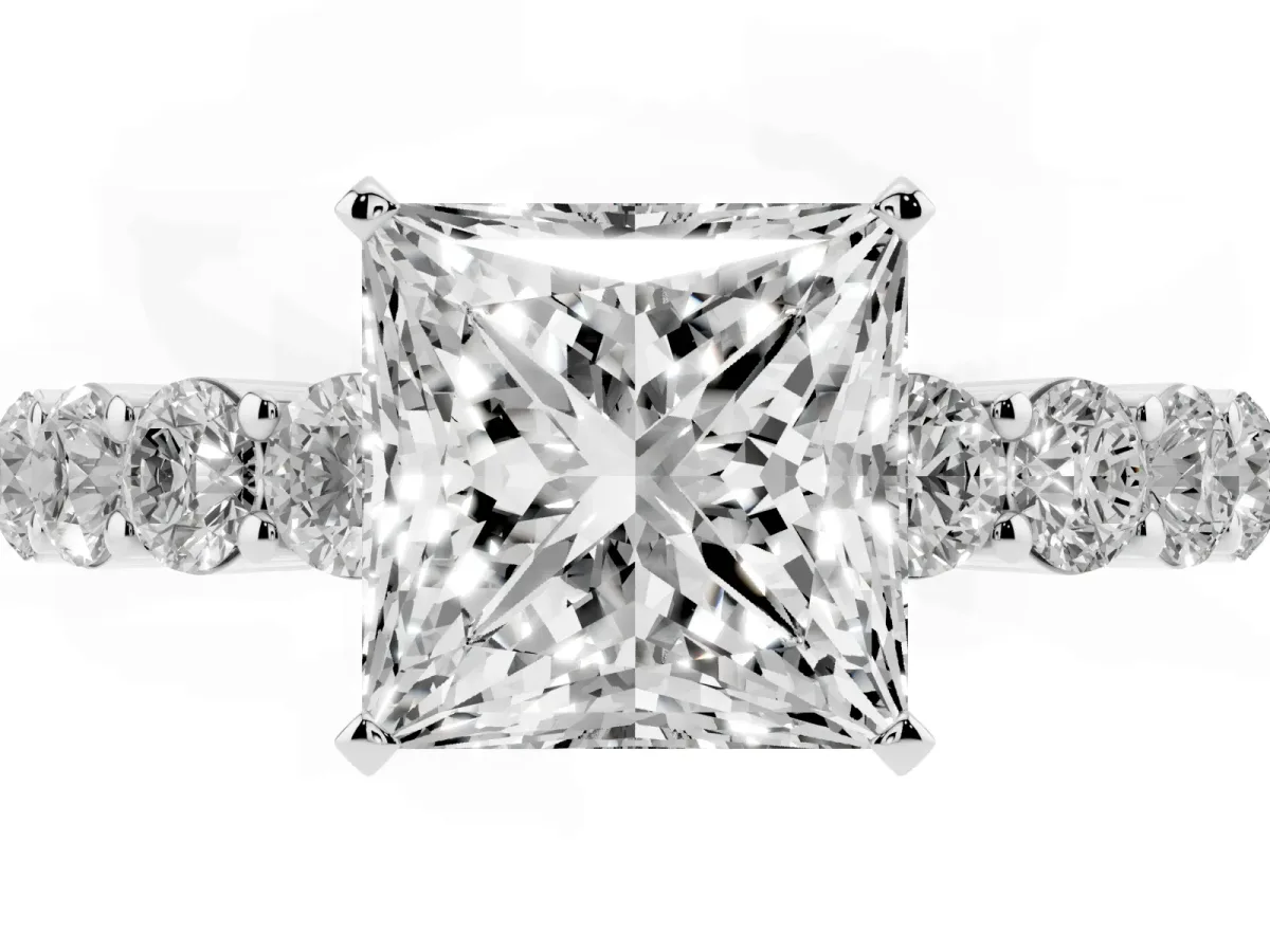 Princess Cut Diamond Solitaire Ring with Shared Prong Round Side Stones Silver