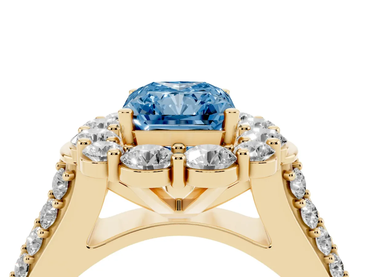 Fancy Blue Radiant Cut Halo Diamond Engagement Ring with Split Shank and Prong Setting Yellow gold