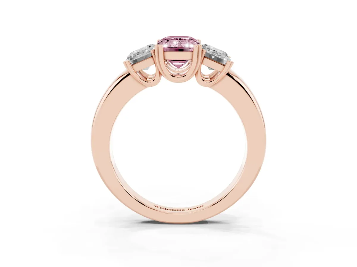 Fancy Pink Three-Stone Emerald Cut Cut Diamond Ring with Channel Set Band and Four-Prong Setting Rose gold
