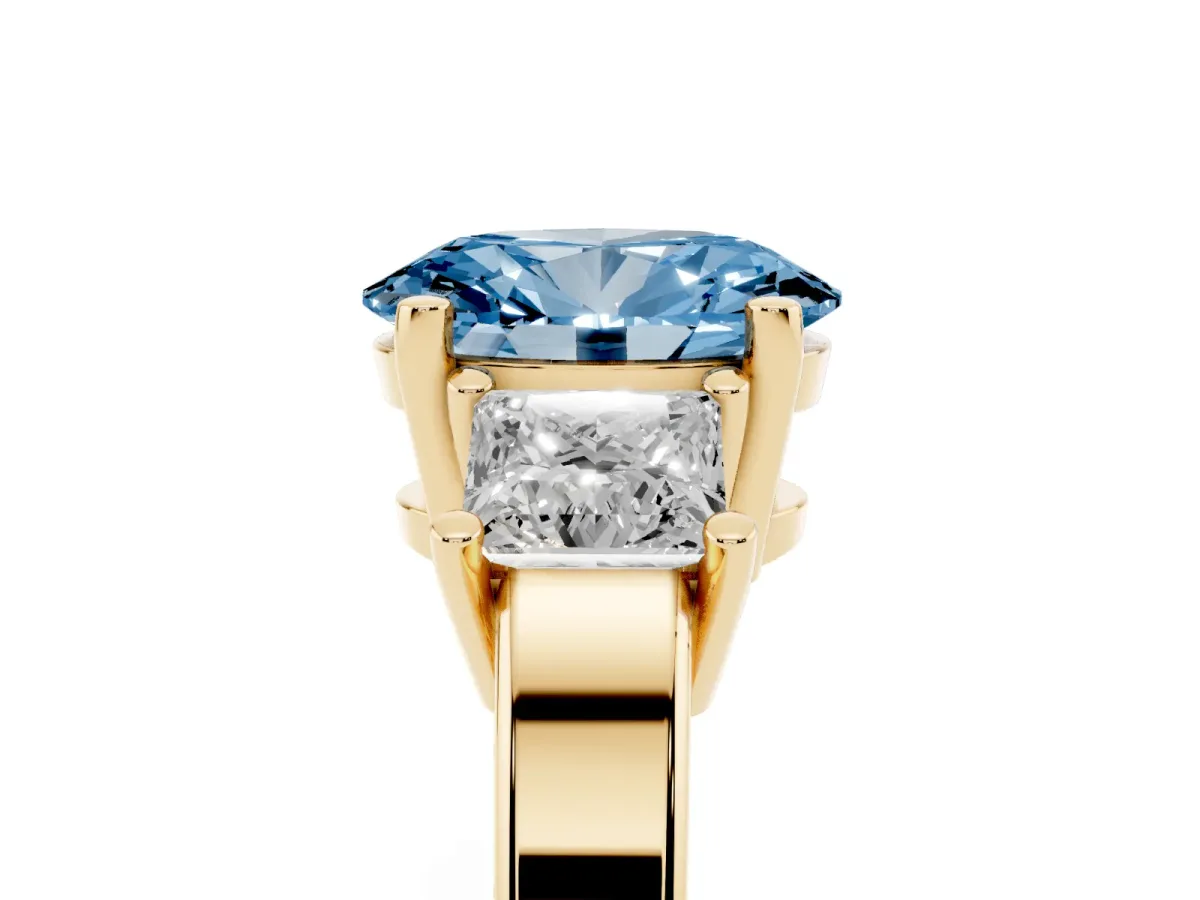 Fancy Blue Three-Stone Oval Cut Cut Solitaire Ring with Prong Setting Yellow gold