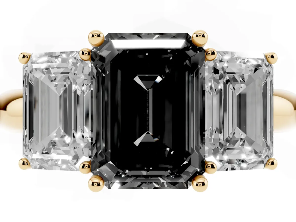 Fancy Black Three-Stone Emerald Cut Cut Diamond Engagement Ring with Prong Setting on a White Gold Band Yellow gold
