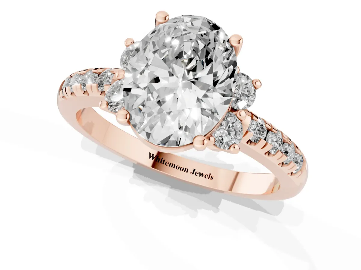 Oval Cut Diamond Three-Stone Pave Band with Four-Prong Setting Rose gold