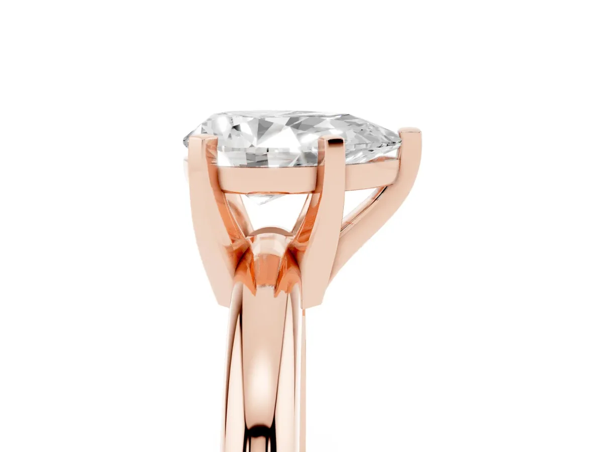 Pear Cut Diamond Solitaire Engagement Ring with Round Band and Four-Prong Setting Rose gold