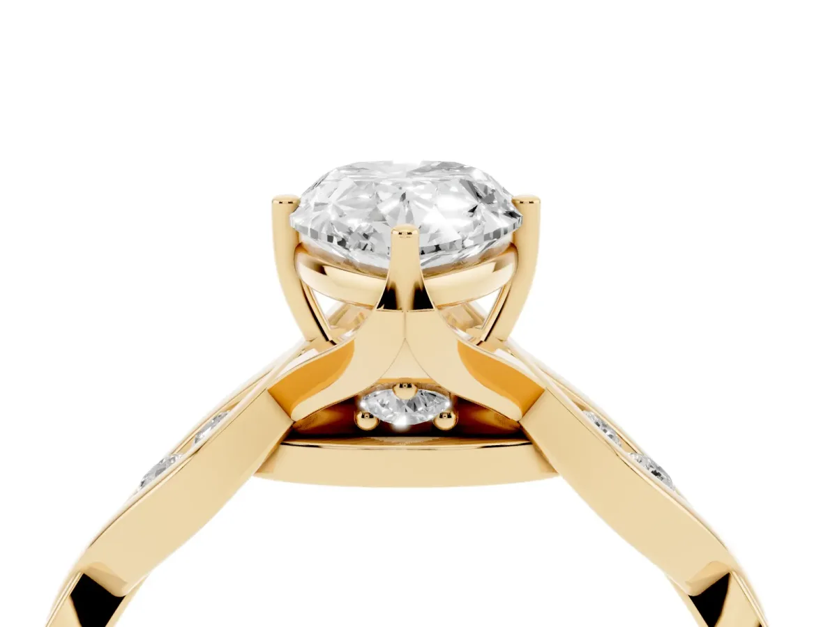 Pear Cut Solitaire Twist Band with Leaf Prong Setting Yellow gold