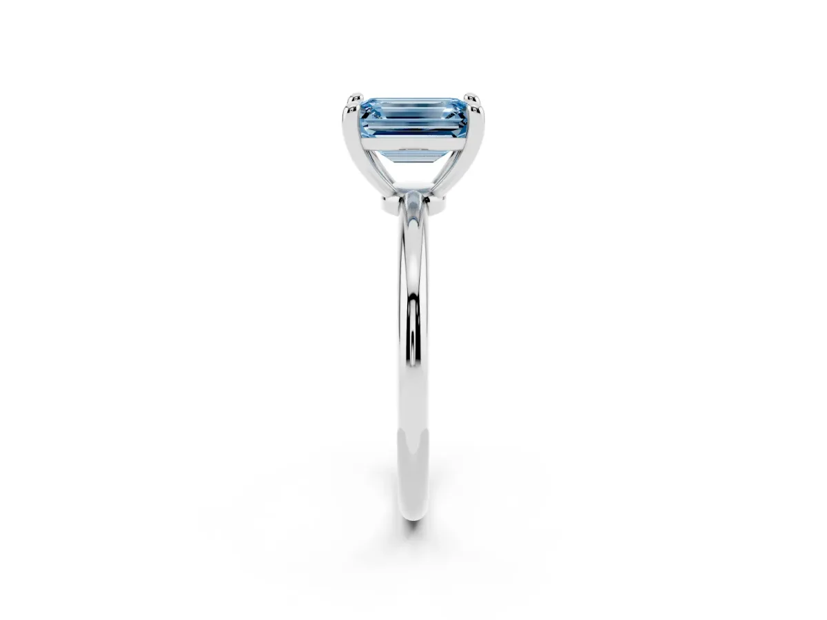 Fancy Blue Emerald Cut Solitaire Diamond Ring with 4-Prong Setting on a Classic Band Platinum