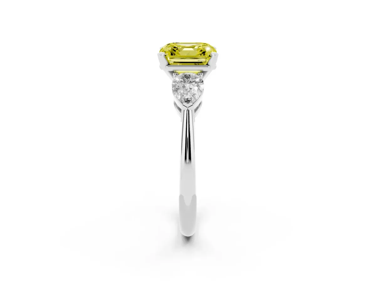 Fancy Yellow Three-Stone Asscher Cut Diamond Ring with Pear Side Stones and Four-Prong Setting Silver