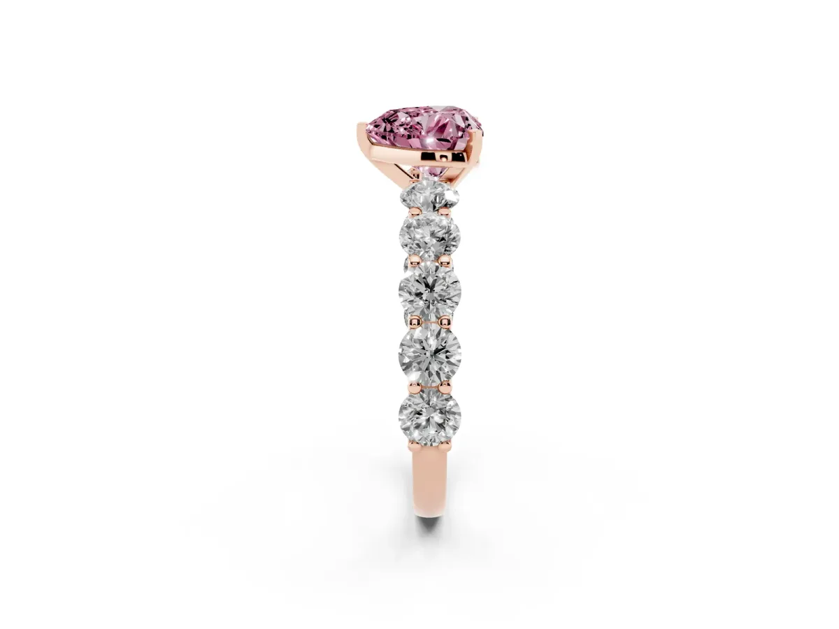 Fancy Pink Heart Cut Diamond Prong Setting with Side Stones on a Pave Band Rose gold