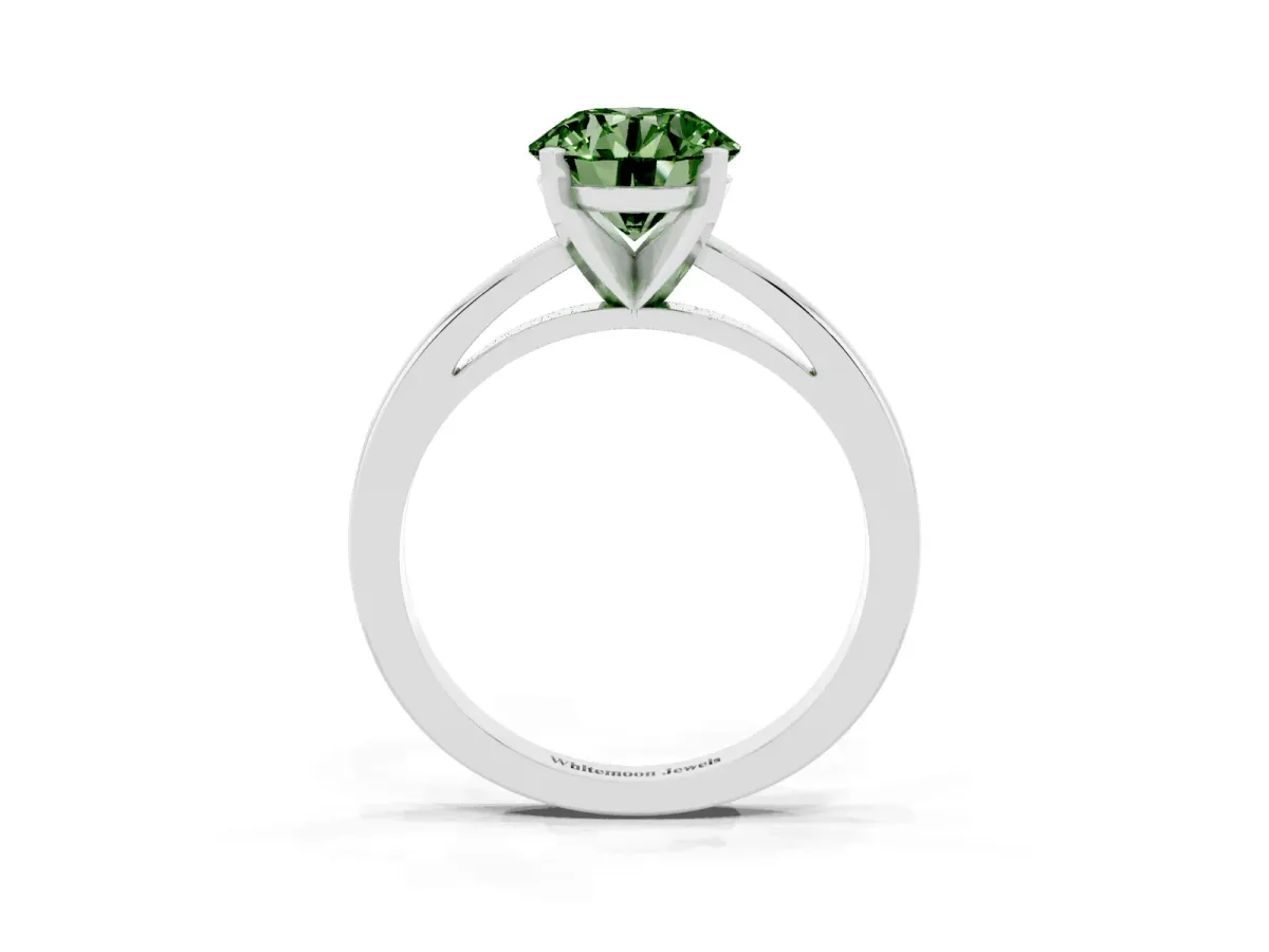 Fancy Green Round Cut Solitaire Diamond Engagement Ring with Four-Prong Setting on a Classic Band Silver