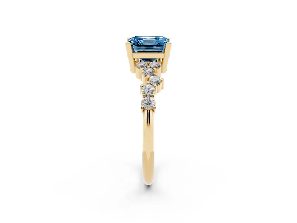 Fancy Blue Asscher Cut Diamond Scattered Round Accent Ring with Prong Setting Yellow gold