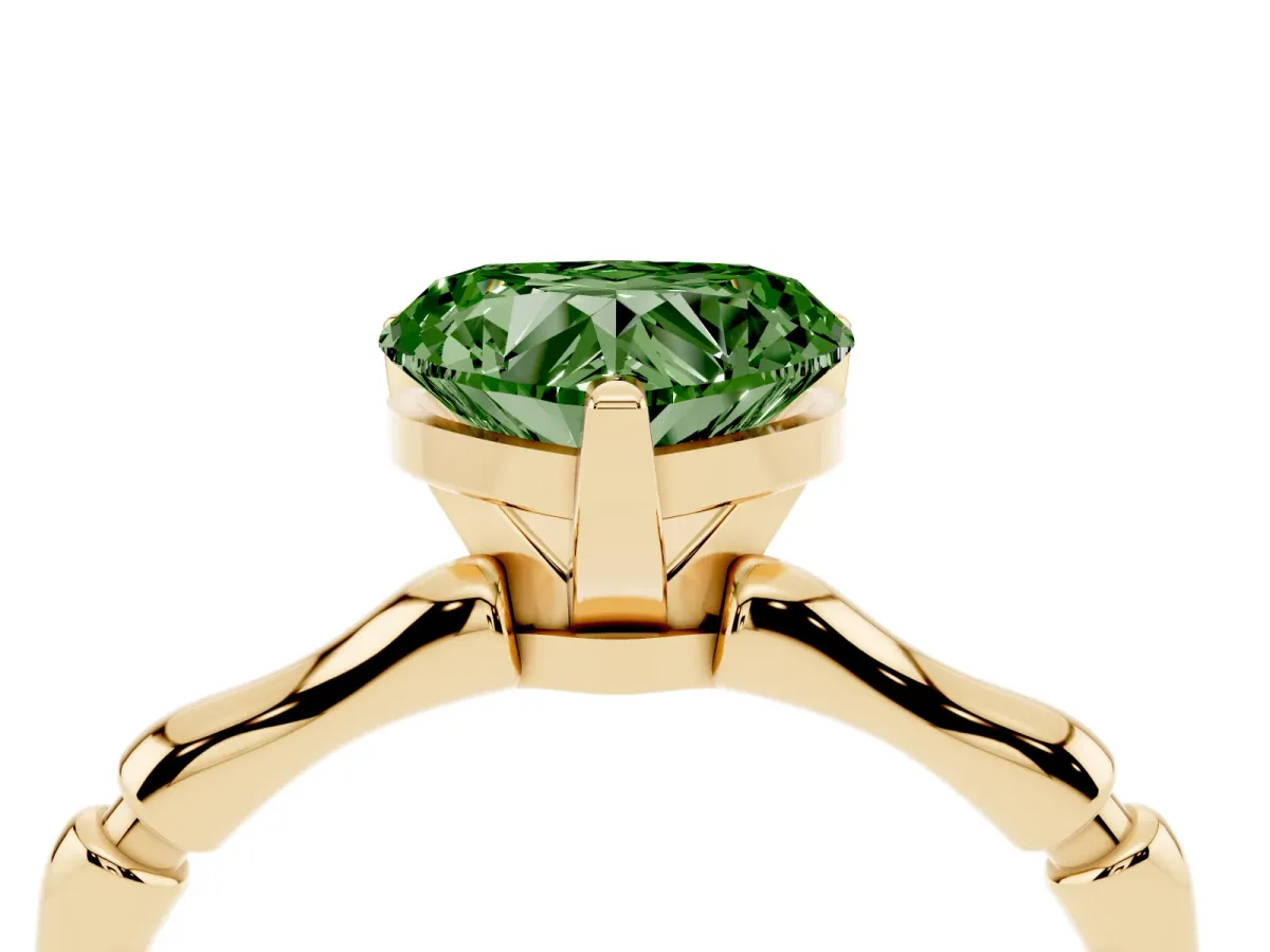 Fancy Green Heart Cut Solitaire Diamond Ring with Bamboo Band and Four-Prong Setting Yellow gold