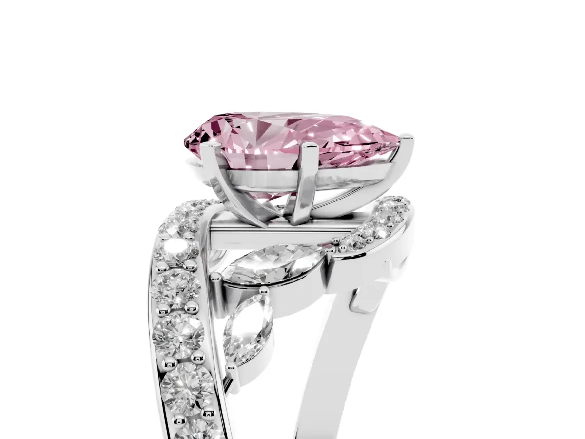 Fancy Pink Pear Cut Solitaire with Pavé Twist Band and Four-Prong Setting Silver