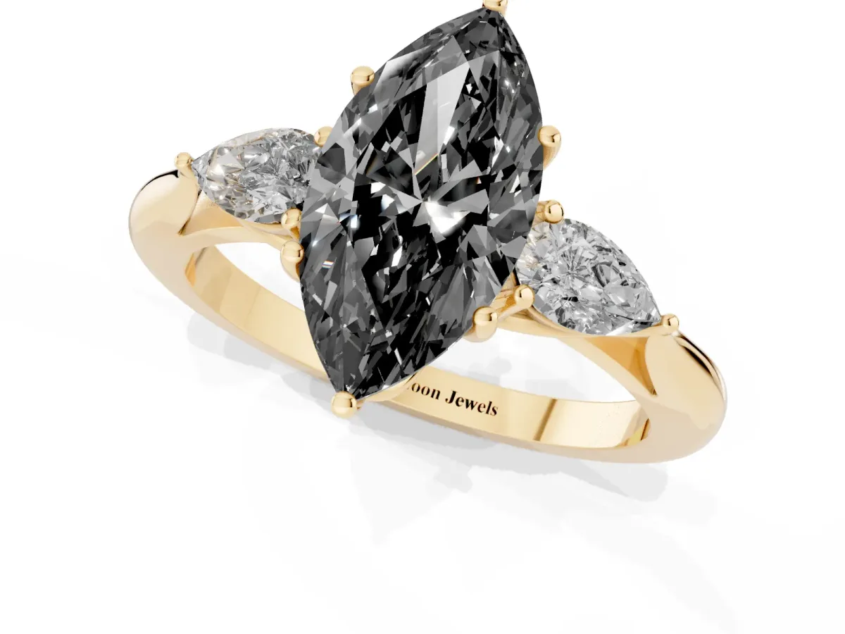 Fancy Black Marquise Cut Diamond Three-Stone Ring with Pear Side Stones and Prong Setting Yellow gold