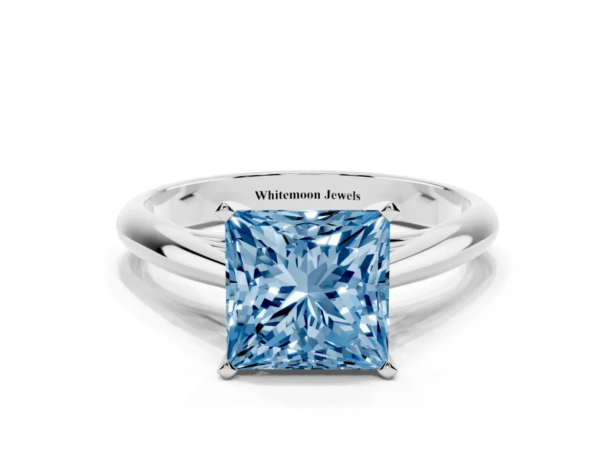Fancy Blue Princess Cut Diamond Solitaire Engagement Ring with Cathedral Setting and Four-Prong Mount Platinum